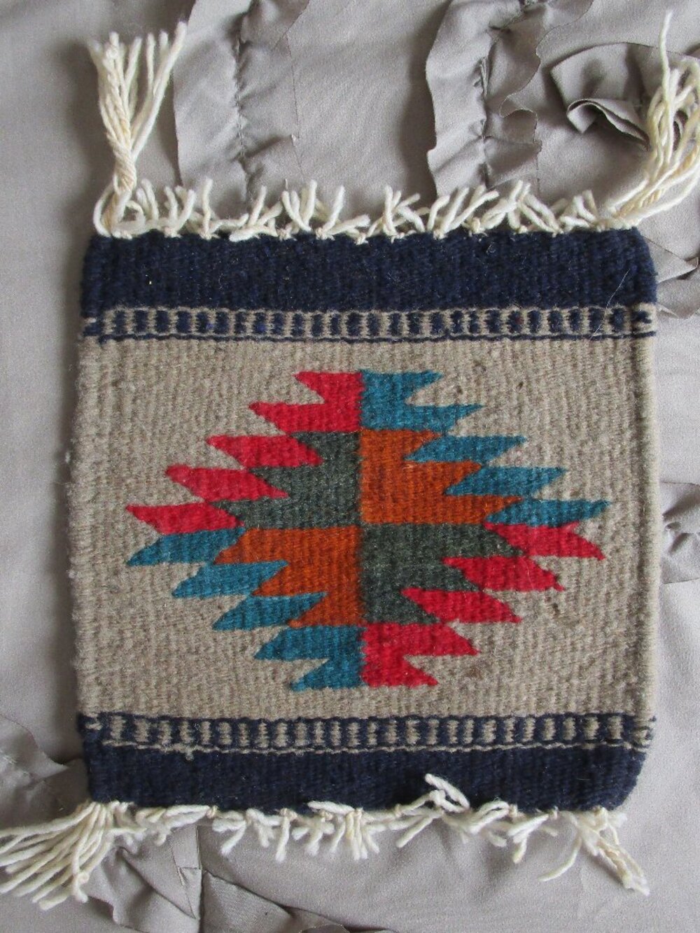 small handwoven wool table rug